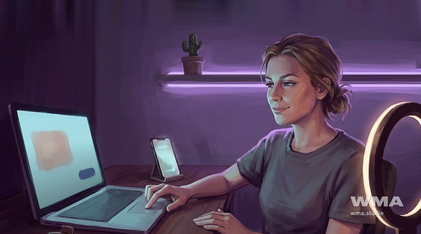 Модель за рабочим столом перед эфиром на CamSoda: ноутбук, кольцевой свет, телефон под рукой